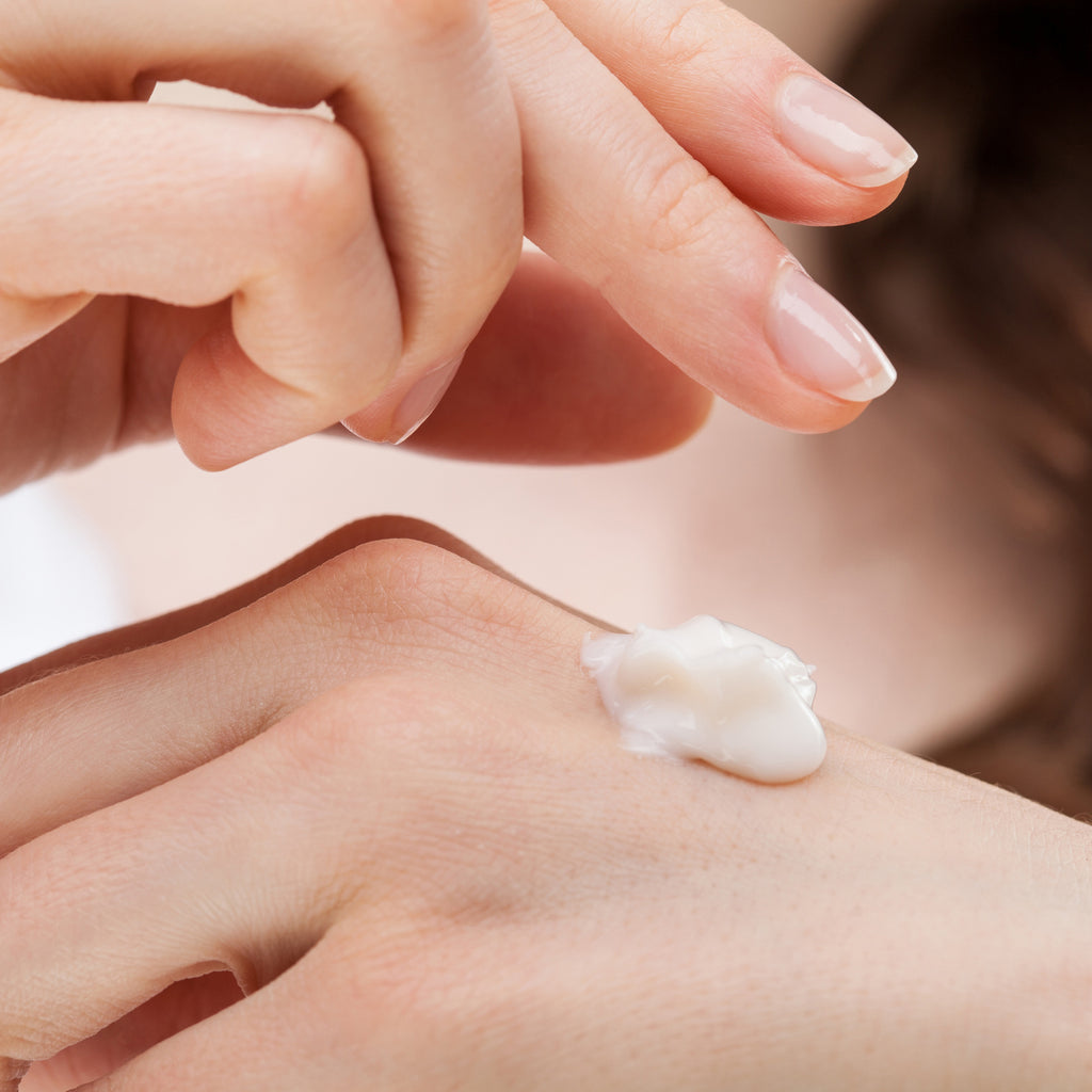 Applying Seams hand cream