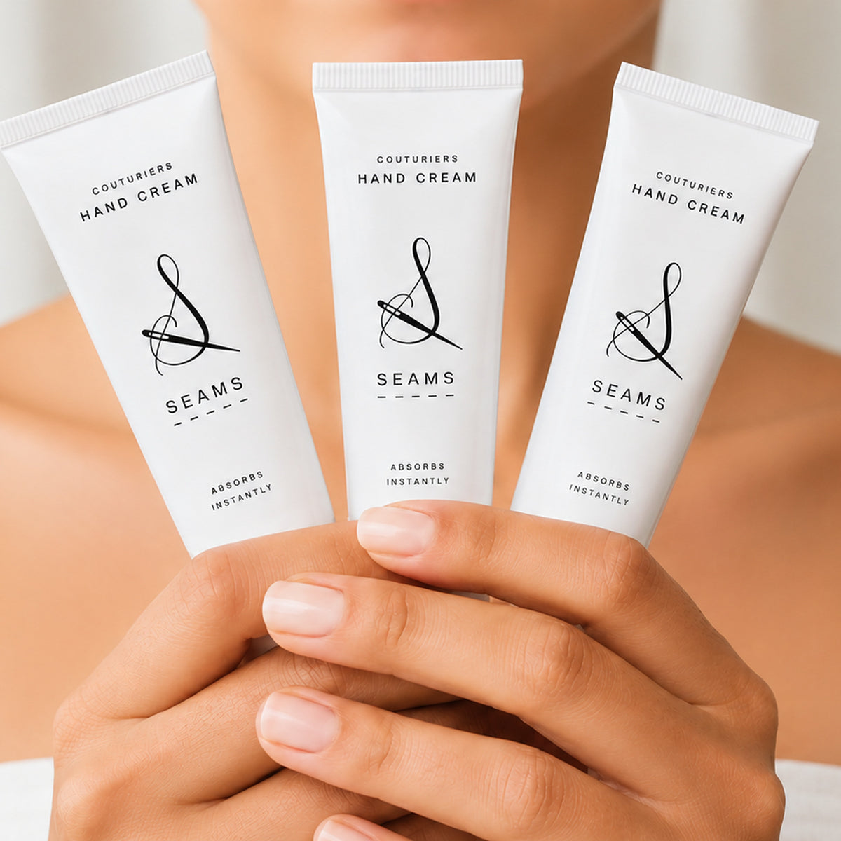 Three Seams Hand Cream tubes held